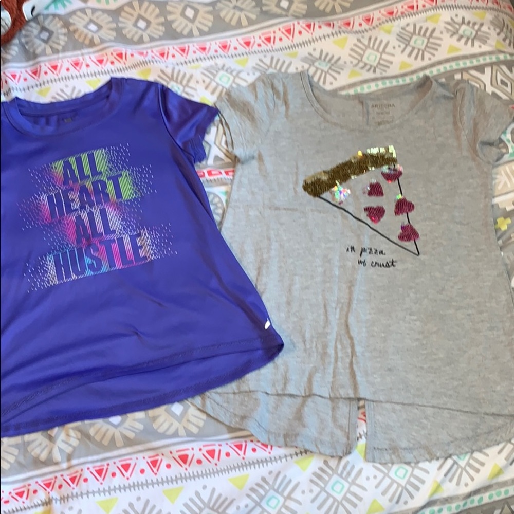 Two girls size 10-12 short sleeve shirts